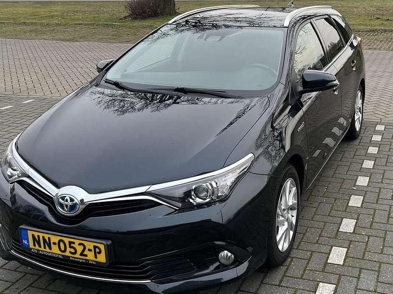 Grijs Occasion 2016 Toyota Auris Hybrid Stationwagen | € 9.980 (Goede deal) - Afbeelding 1/4