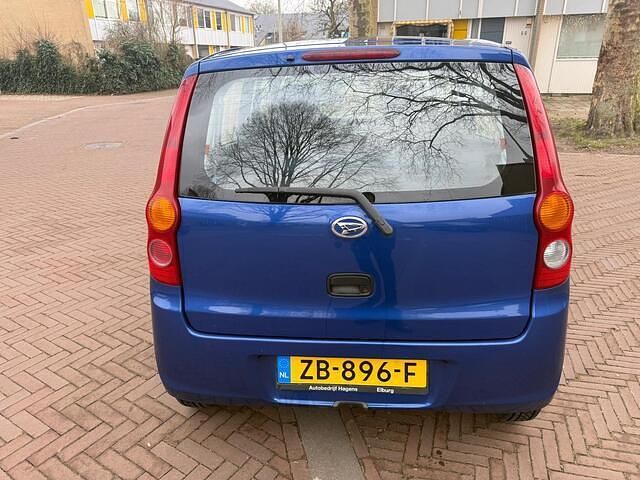 Occasion Daihatsu Cuore 69 PK (50 kW) 2007 Blauw Hatchback