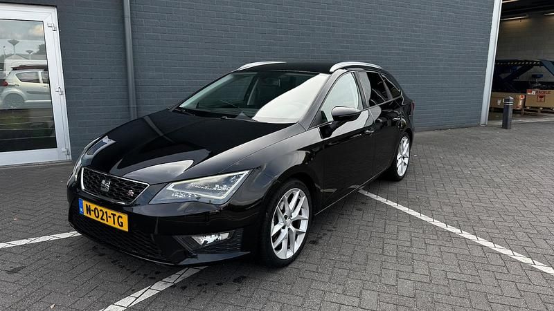 Zwart Gebruikt 2015 Seat Leon ST FR Stationwagen | € 11.475 - Afbeelding 1/4