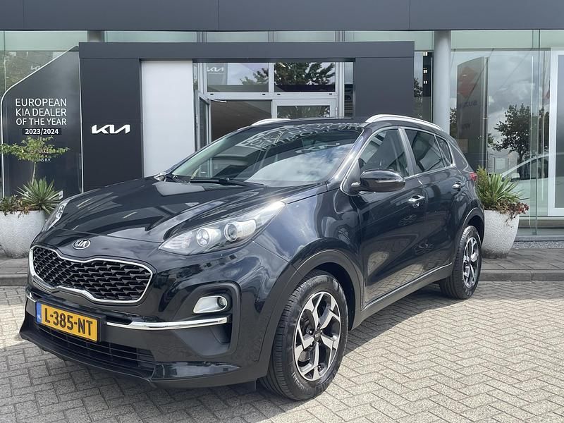 Zwart Gebruikt 2021 Kia Sportage SUV | € 25.945 (Eerlijke prijs) - Afbeelding 1/4