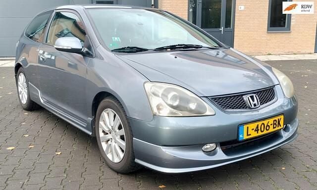 Grijs Gebruikt 2005 Honda Civic LS Hatchback | € 2.949 (Eerlijke prijs) - Afbeelding 1/4