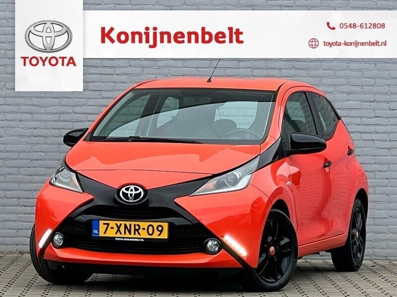 Oranje, metallic lak Gebruikt 2014 Toyota Aygo X-cite Hatchback | € 9.995 (Duur) - Afbeelding 1/3