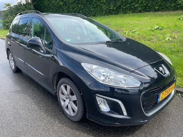 Zwart Gebruikt 2013 Peugeot 308 Active Stationwagen | € 1.999 (Goede deal) - Afbeelding 1/4