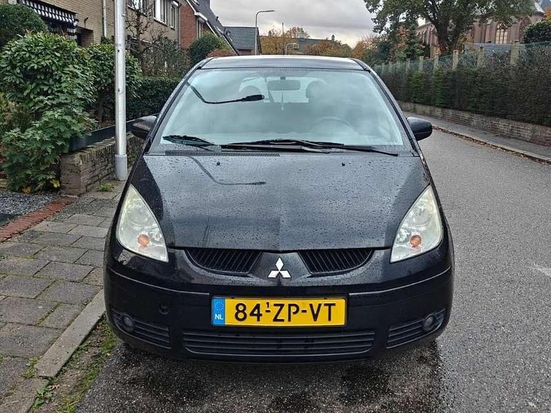 Zwart Gebruikt 2008 Mitsubishi Colt Hatchback | € 2.175 (Eerlijke prijs) - Afbeelding 1/4