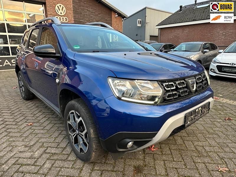 Blauw (metallic) Gebruikt 2020 Dacia Duster Anniversary SUV | € 14.950 (Goede deal) - Afbeelding 1/4