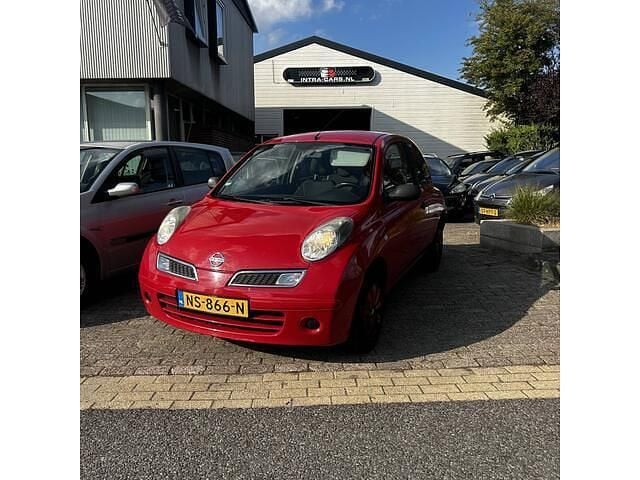 Rood Gebruikt 2009 Nissan Micra Hatchback | € 1.495 (Goede deal) - Afbeelding 1/4