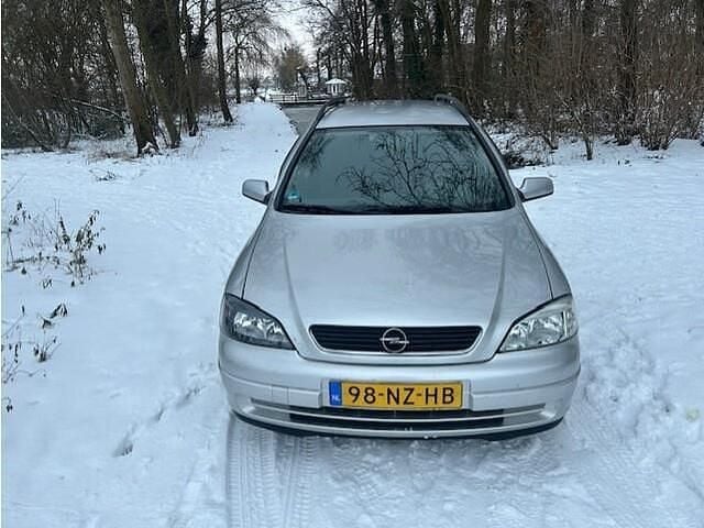 Grijs Occasion 2004 Opel Astra Njoy Stationwagen | € 950 (Eerlijke prijs) - Afbeelding 1/4