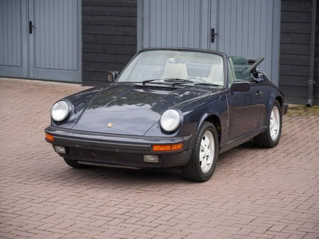 Blauw Gebruikt 1987 Porsche 911 Cabriolet | € 54.900 - Afbeelding 1/4
