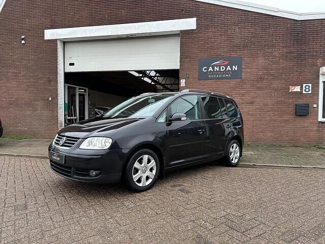 Zwart (metallic) Gebruikt 2004 VW Touran Highline MPV | € 2.499 (Eerlijke prijs) - Afbeelding 1/4