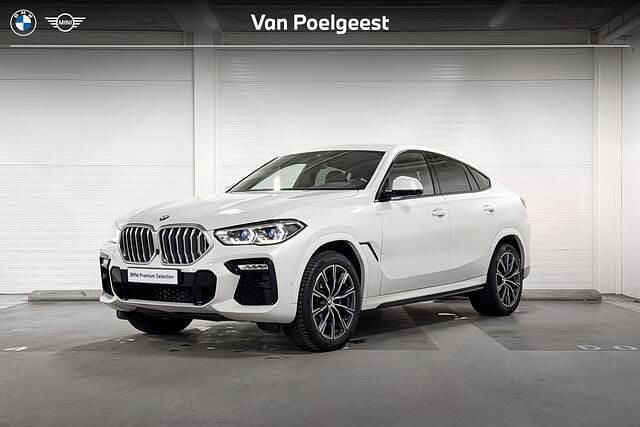 Mineralweiss metallic (a96) (licht wit metallic) Occasion 2021 BMW X6 Executive SUV | € 66.900 - Afbeelding 1/4