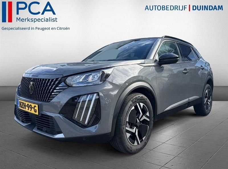 Grijs Gebruikt 2024 Peugeot e-2008 Allure SUV | € 27.950 - Afbeelding 1/4