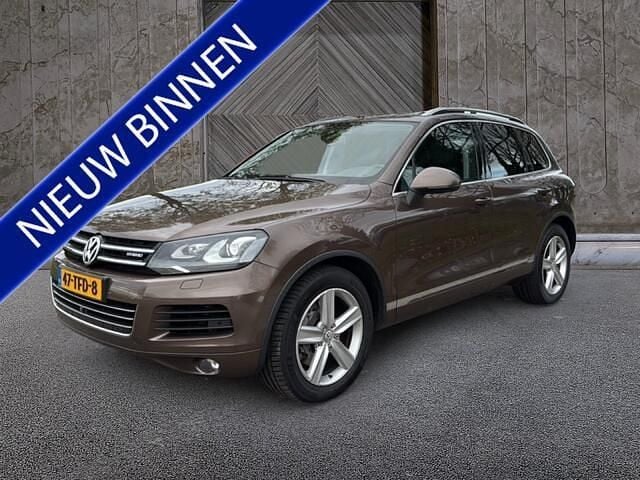 Bruin Gebruikt 2010 VW Touareg Highline SUV | € 18.950 - Afbeelding 1/4