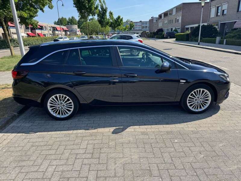 Blauw Gebruikt 2019 Opel Astra Edition Stationwagen | € 12.250 (Goede deal) - Afbeelding 1/4