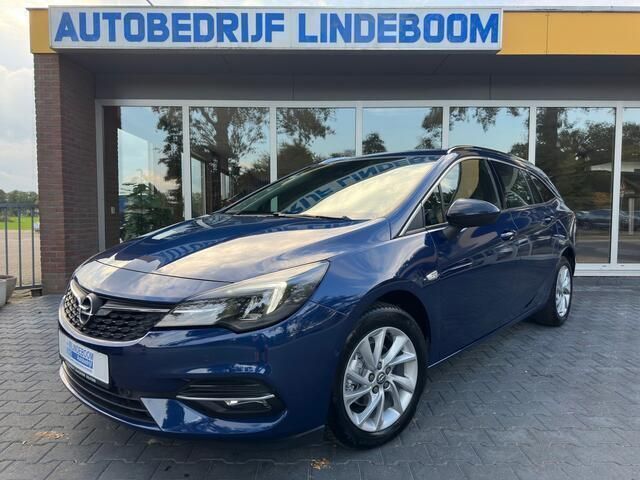 Blauw Gebruikt 2021 Opel Astra Elegance Stationwagen | € 16.950 (Eerlijke prijs) - Afbeelding 1/4