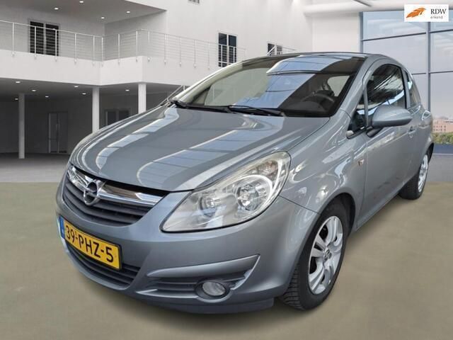 Grijs Gebruikt 2011 Opel Corsa Cosmo Hatchback | € 1.850 (Goede deal) - Afbeelding 1/4