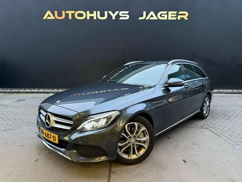 Grijs Occasion 2015 Mercedes C350e Edition Stationwagen | € 16.950 (Eerlijke prijs) - Afbeelding 1/4