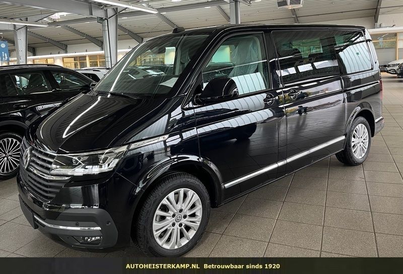 Zwart Gebruikt 2023 VW Multivan Highline Van | € 64.950 (Eerlijke prijs) - Afbeelding 1/4