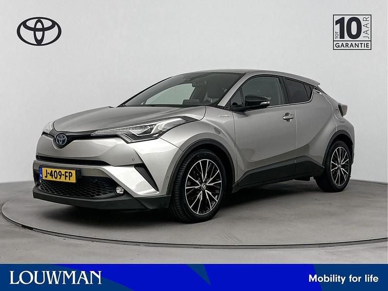 Grijs metallic Gebruikt 2017 Toyota C-HR+ Executive SUV | € 19.200 - Afbeelding 1/3