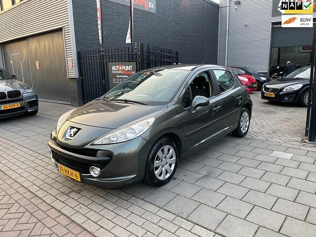 Grijs Occasion 2009 Peugeot 207 Hatchback | € 1.999 (Eerlijke prijs) - Afbeelding 1/4