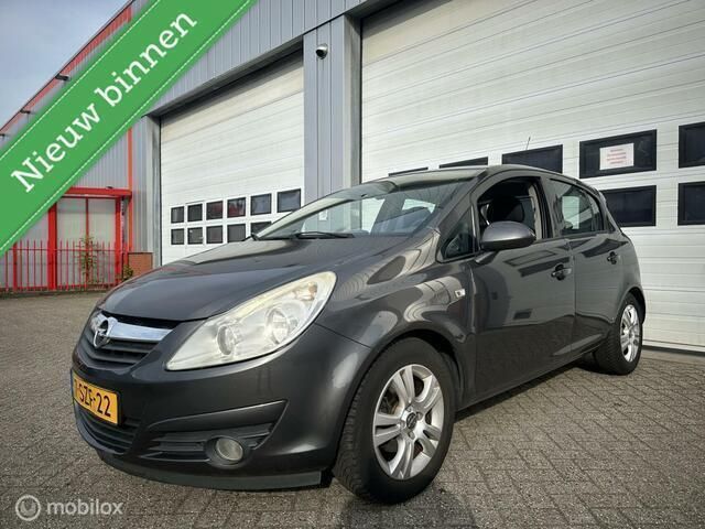 Grijs Gebruikt 2010 Opel Corsa Edition Hatchback | € 3.499 (Eerlijke prijs) - Afbeelding 1/4