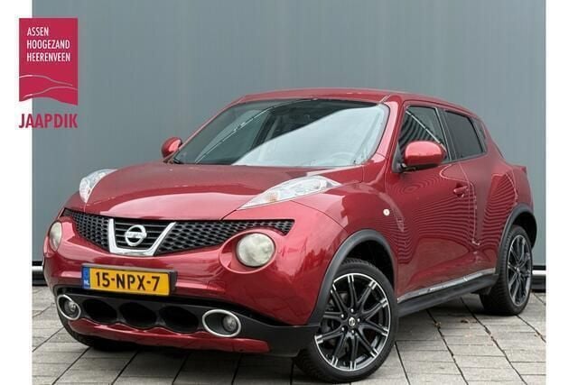 Rood, metallic lak Gebruikt 2010 Nissan Juke Acenta SUV | € 6.844 (Iets duurder) - Afbeelding 1/4