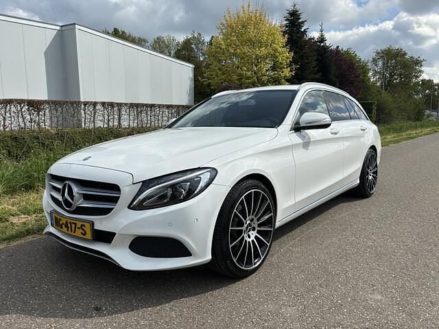 Wit Occasion 2015 Mercedes C180 Prestige Stationwagen | € 14.650 (Eerlijke prijs) - Afbeelding 1/4