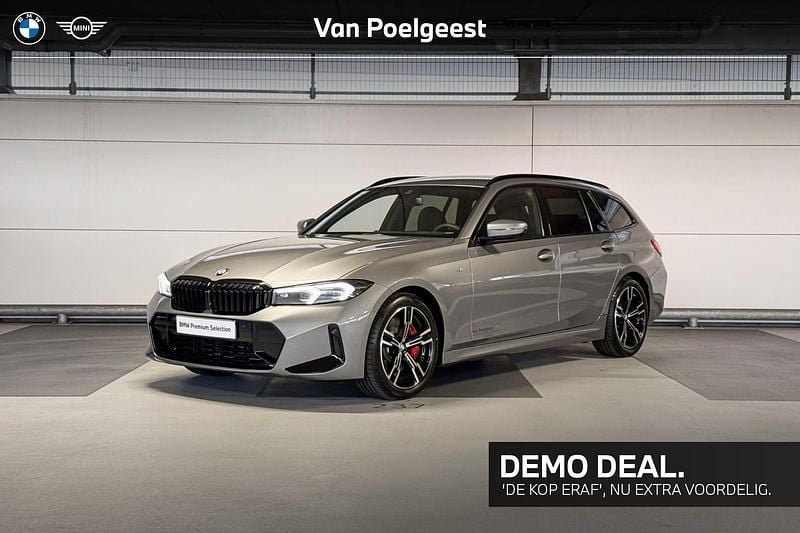 Skyscraper grey metallic (grijs metallic) Gebruikt 2025 BMW 318 M Sport Stationwagen | € 45.900 (Eerlijke prijs) - Afbeelding 1/4