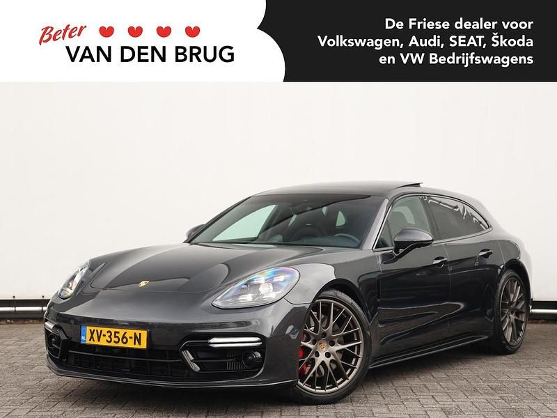 Grijs (metallic) Gebruikt 2019 Porsche Panamera Sport Turismo Stationwagen | € 83.800 - Afbeelding 1/4