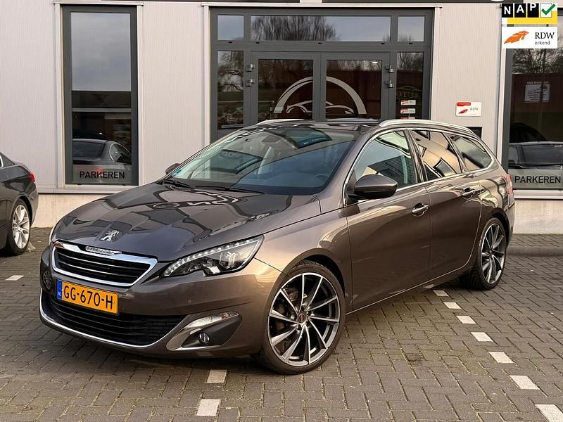 Grijs Occasion 2015 Peugeot 308 Premium Stationwagen | € 8.750 (Iets duurder) - Afbeelding 1/4