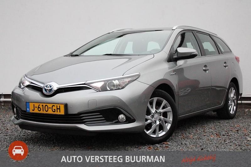 Grijs Gebruikt 2016 Toyota Auris Hybrid Stationwagen | € 12.950 (Goede deal) - Afbeelding 1/4