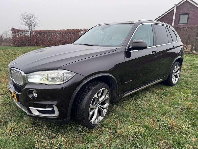Bruin Occasion 2013 BMW X5 SUV | € 19.500 - Afbeelding 1/4