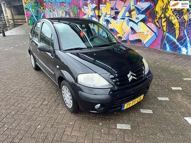 Zwart Occasion 2006 Citroën C3 Prestige Hatchback | € 1.495 (Eerlijke prijs) - Afbeelding 1/4