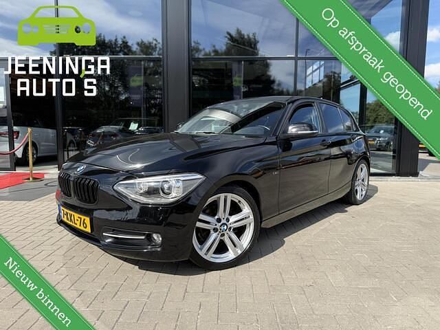 Zwart Gebruikt 2013 BMW 114 Executive Hatchback | € 6.900 (Goede deal) - Afbeelding 1/4