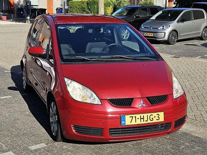 Rood Gebruikt 2008 Mitsubishi Colt Invite+ Stationwagen | € 1.549 - Afbeelding 1/4