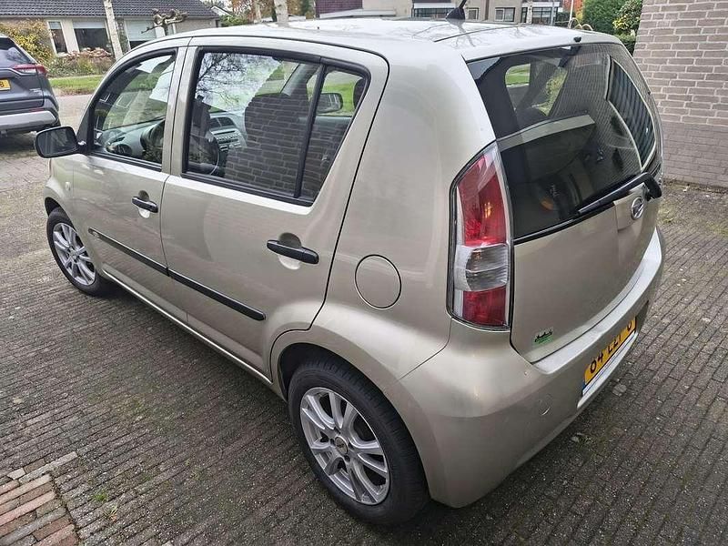 Occasion Daihatsu Sirion 69 PK (50 kW) 2010 Beige Hatchback