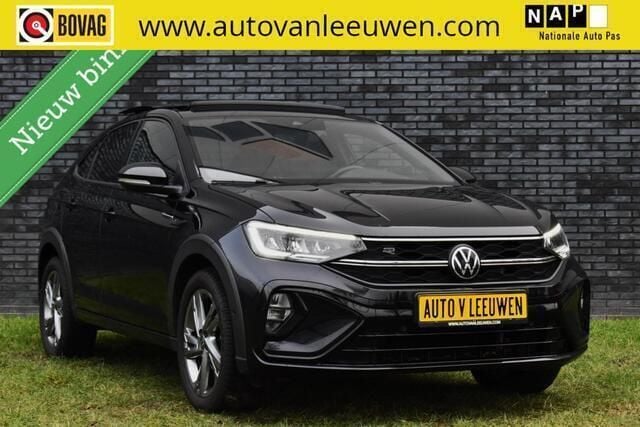 Zwart Gebruikt 2023 VW Taigo R-line SUV | € 26.925 (Eerlijke prijs) - Afbeelding 1/4