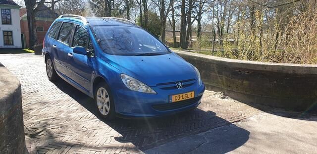 Blauw Gebruikt 2002 Peugeot 307 Stationwagen | € 999 (Goede deal) - Afbeelding 1/4