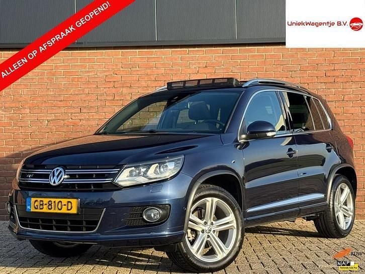 Blauw (metallic) Occasion 2015 VW Tiguan R-line SUV | € 14.995 (Eerlijke prijs) - Afbeelding 1/4
