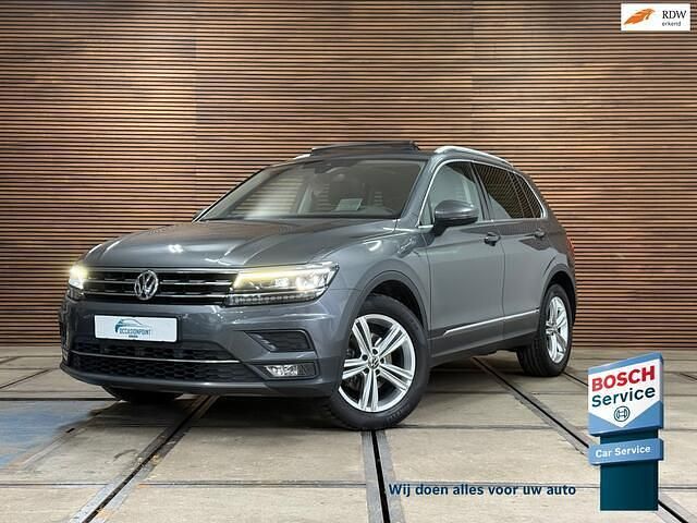 Grijs Gebruikt 2020 VW Tiguan Highline SUV | € 26.890 (Goede deal) - Afbeelding 1/4
