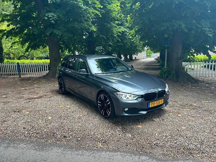 Grijs Occasion 2014 BMW 316 Executive Stationwagen | € 10.500 (Eerlijke prijs) - Afbeelding 1/4