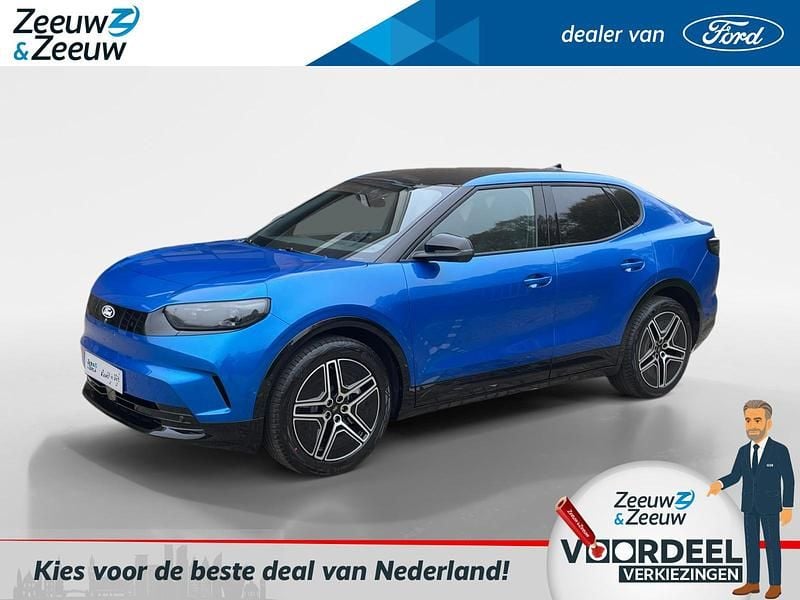 Blauw Nieuw 2025 Ford Capri Extended Range SUV | € 52.400 - Afbeelding 1/4