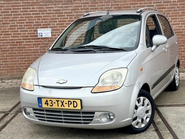 Grijs, metallic lak Gebruikt 2007 Chevrolet Matiz Hatchback | € 1.799 (Eerlijke prijs) - Afbeelding 1/4