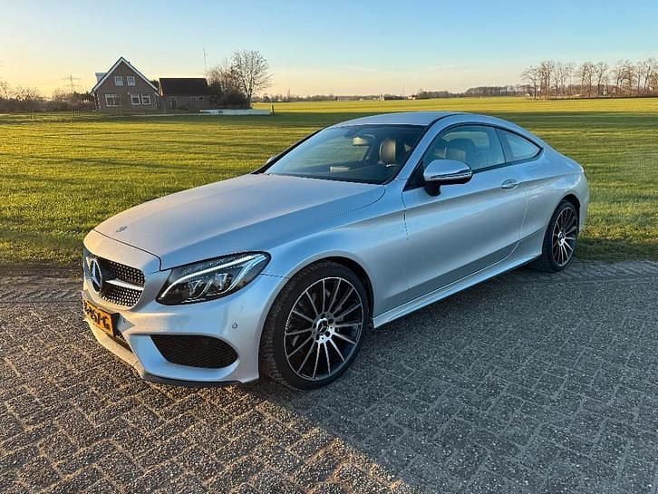 Grijs (metallic) Occasion 2016 Mercedes C180 Ambition Coupé | € 19.950 (Goede deal) - Afbeelding 1/4