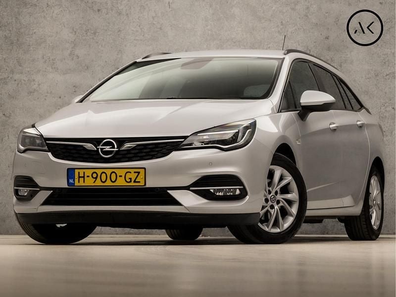 Grijs Gebruikt 2020 Opel Astra Sport Stationwagen | € 13.245 (Goede deal) - Afbeelding 1/4