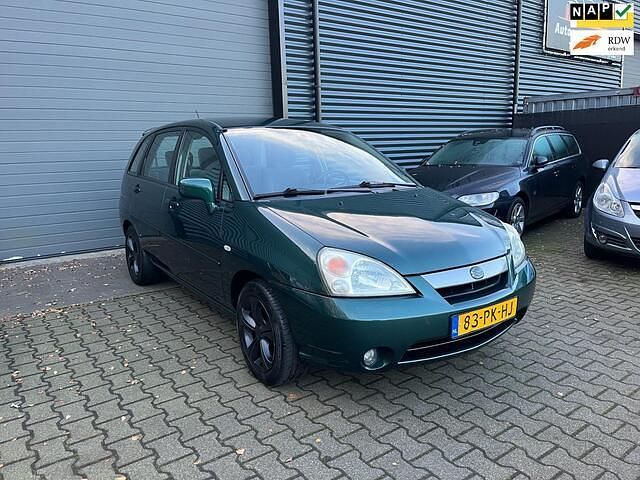 Groen (metallic) Gebruikt 2004 Suzuki Liana GLX Hatchback | € 995 (Goede deal) - Afbeelding 1/4