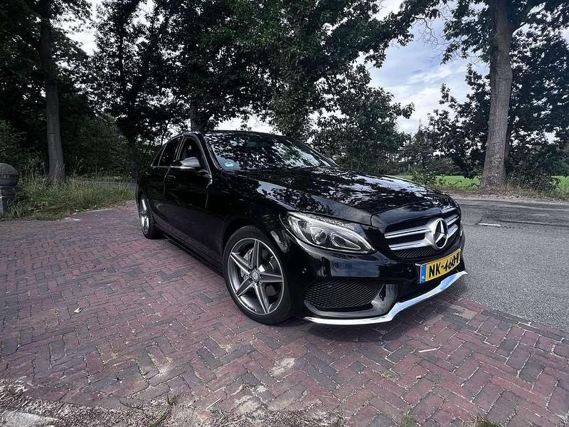 Zwart Gebruikt 2017 Mercedes C180 AMG Sedan | € 20.750 (Goede deal) - Afbeelding 1/4