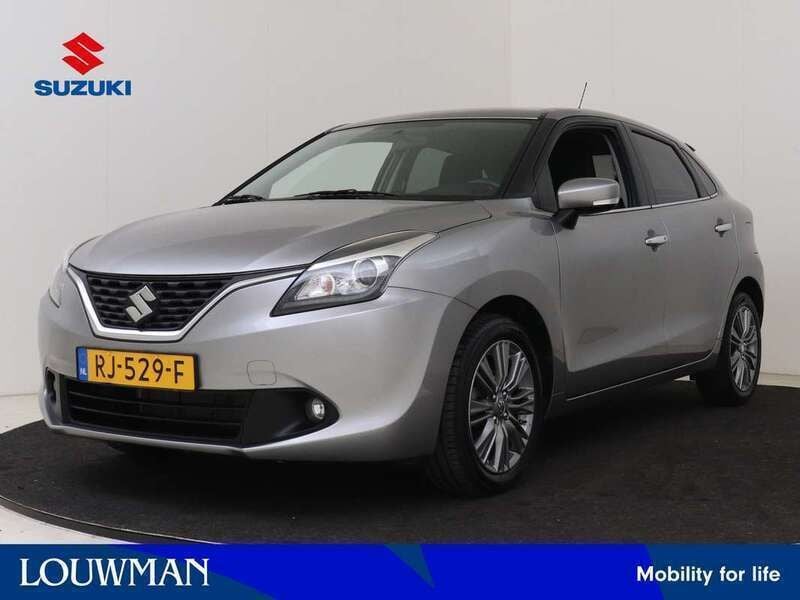 Grijs metallic Gebruikt 2017 Suzuki Baleno Hatchback | € 12.450 (Eerlijke prijs) - Afbeelding 1/3