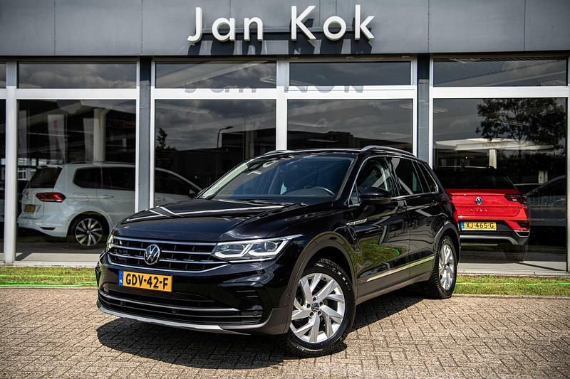 Zwart Gebruikt 2021 VW Tiguan Elegance SUV | € 30.600 (Goede deal) - Afbeelding 1/4
