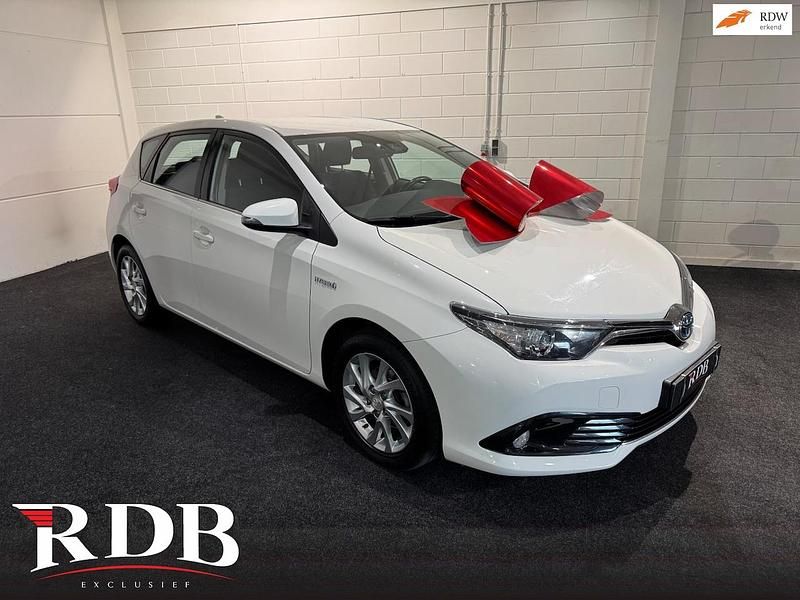 Wit (metallic) Gebruikt 2016 Toyota Auris Hybrid Hatchback | € 13.000 (Super prijs) - Afbeelding 1/4