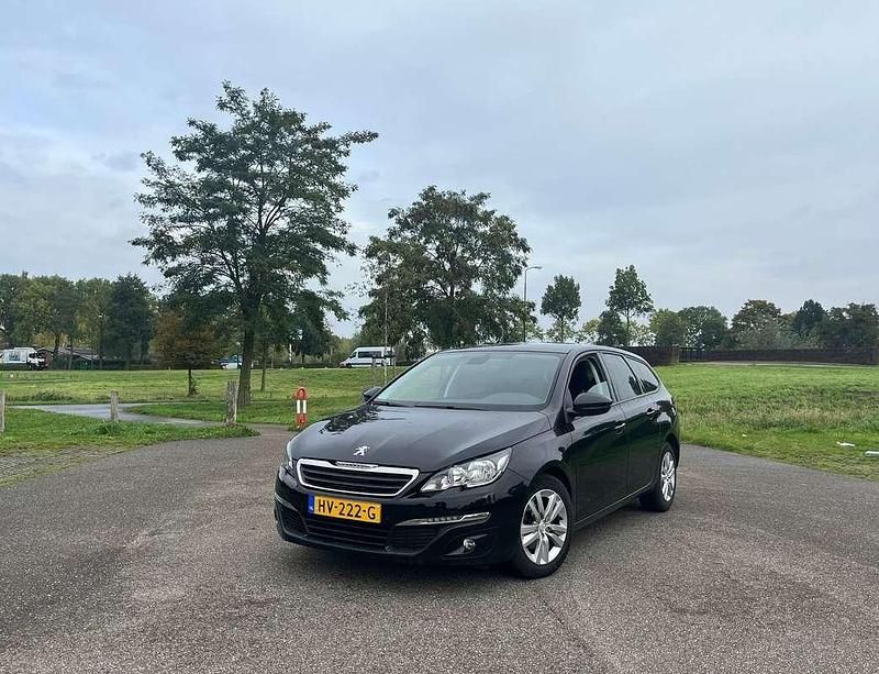 Zwart Gebruikt 2015 Peugeot 308 Stationwagen | € 5.699 (Eerlijke prijs) - Afbeelding 1/4
